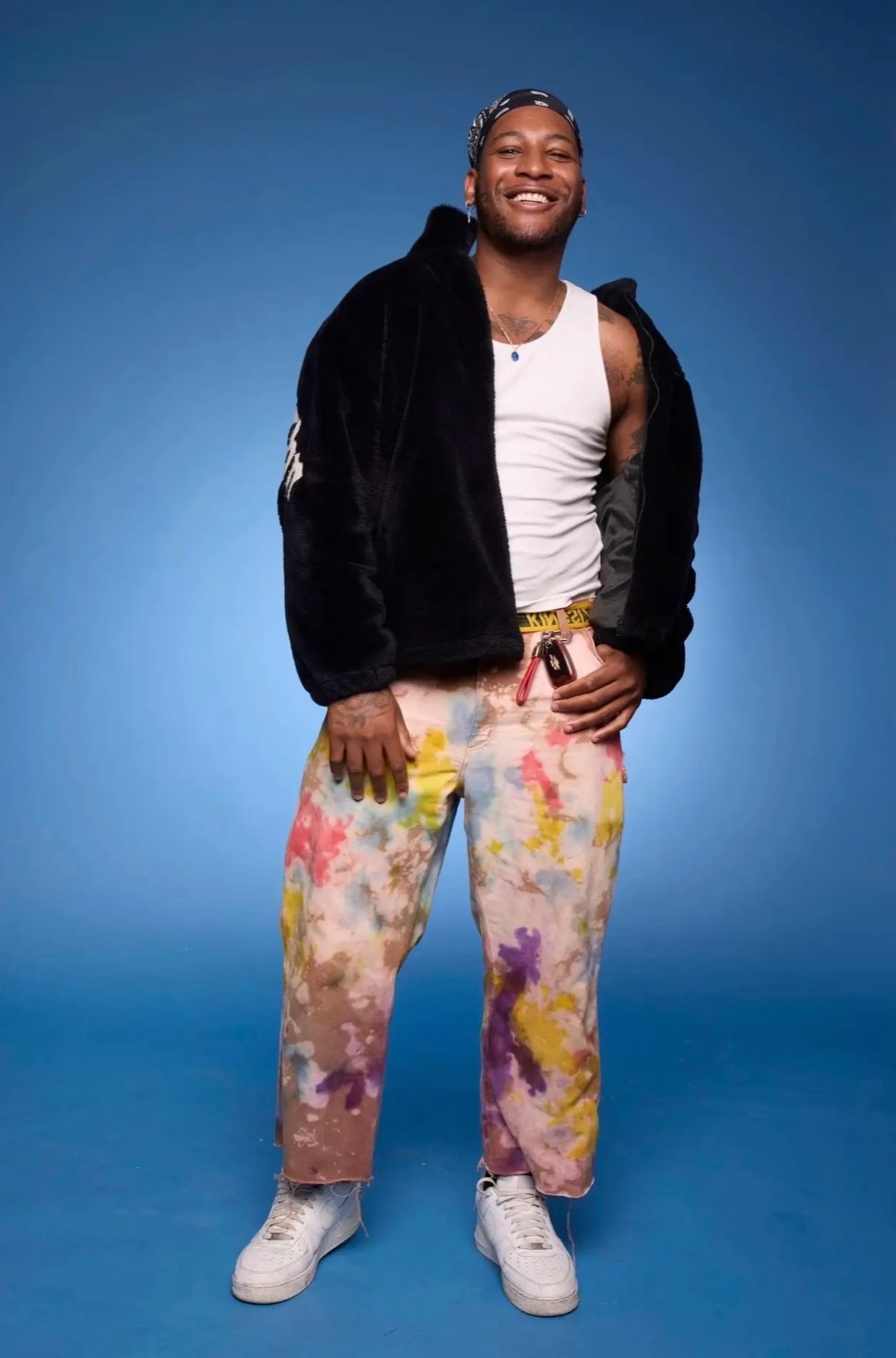 portrait of the wardrobe stylist in a black fur jacket and hand-dyed jeans