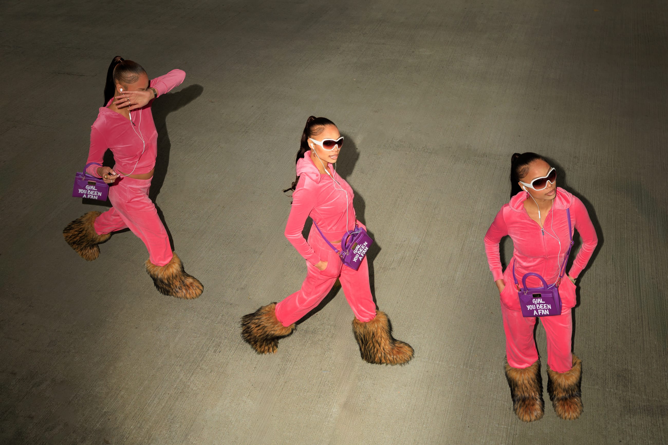 three figures in pink velour and fur boots, shot from above